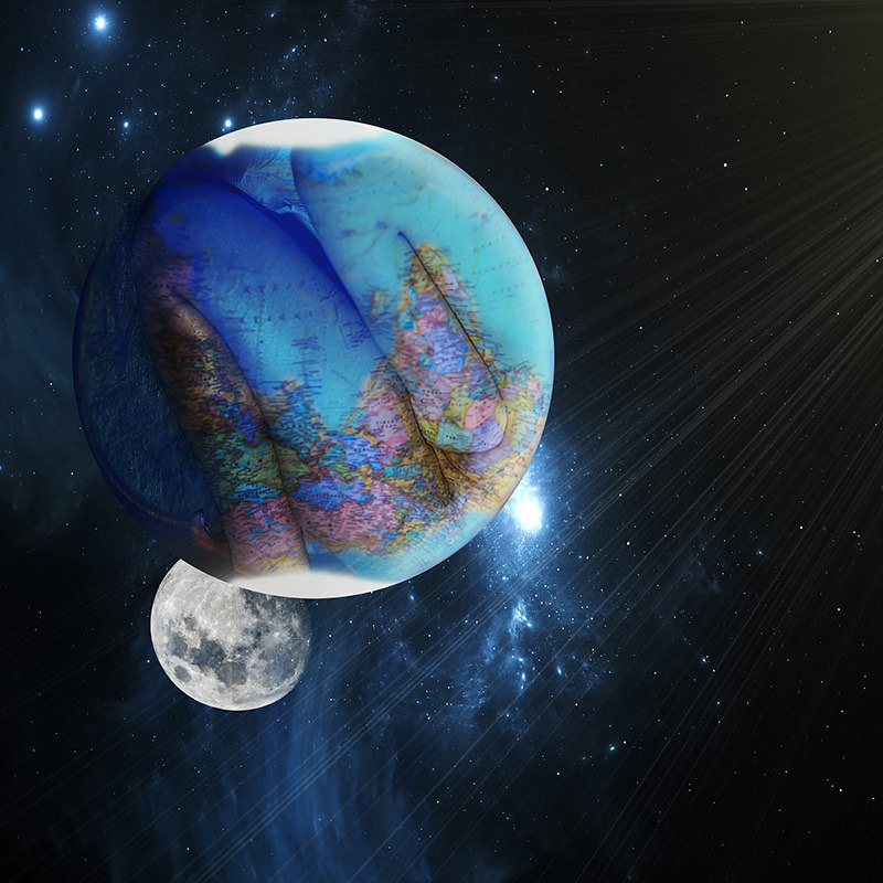 A bright full moon beneath a glowing globe of the Earth, which has a transparent overlay of a blue-gloved hand holding a detailed world map, set against a star-filled night sky with streaks of light