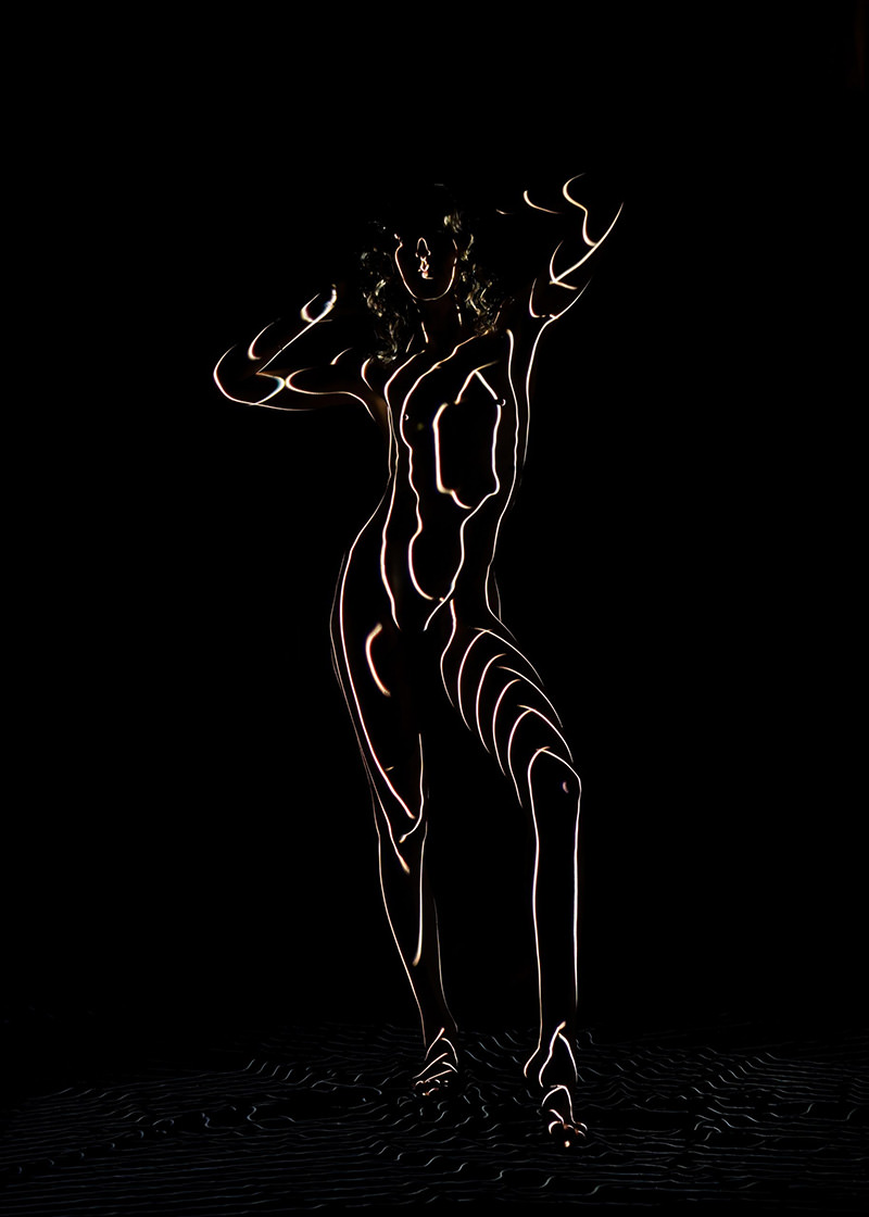 A standing nude female figure outlined with glowing, curved lines against a black background, highlighting contours and shapes of the body with artistic lighting.