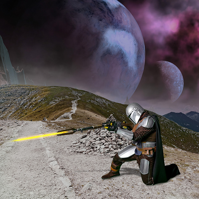 Armored figure kneeling on rocky terrain, firing a long spear-like weapon emitting yellow light, with two large planets and purple nebula clouds in the sky background