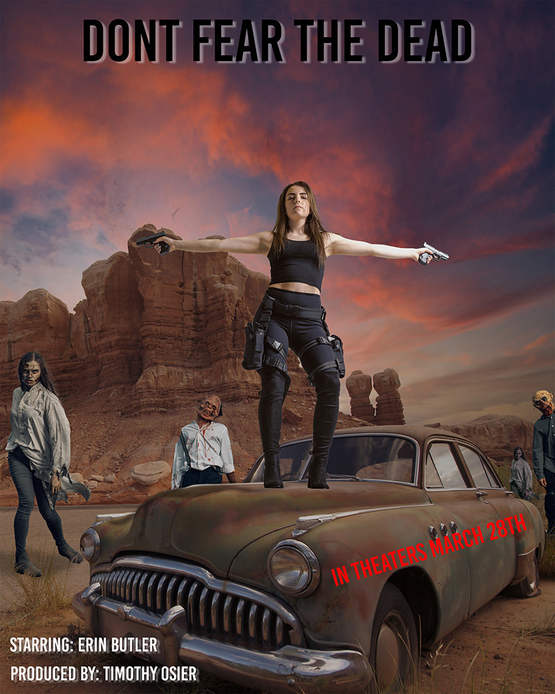 A woman in black clothes stands confidently with arms outstretched holding guns while standing on an old rusted car in a desert-like landscape. Surrounding her are four zombies with decayed faces and torn clothing. The sky is a dramatic blend of orange and purple hues. Text reads 'DONT FEAR THE DEAD' at the top, and 'IN THEATERS MARCH 28TH' in red on the car. Additional text mentions starring Erin Butler and producer Timothy Osier.
